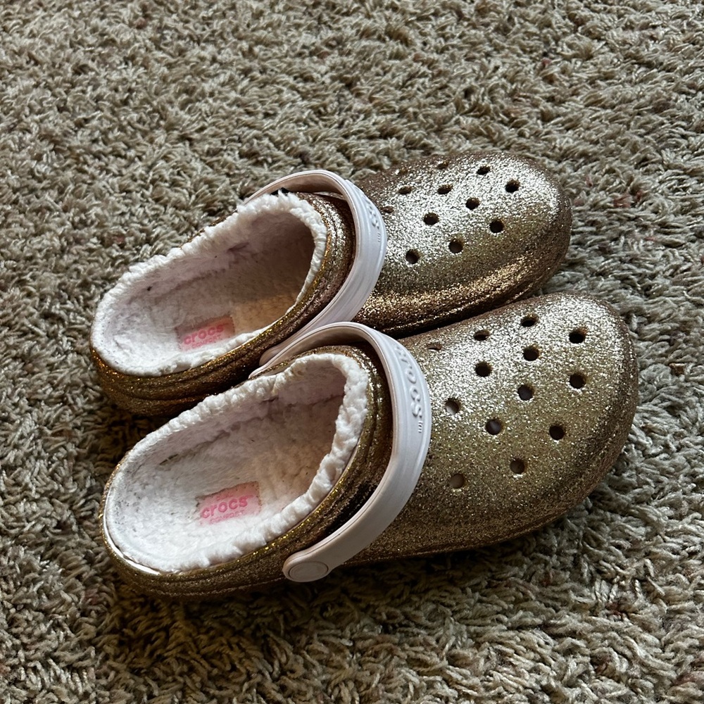 Very gently used fuzzy glitter crocs.
